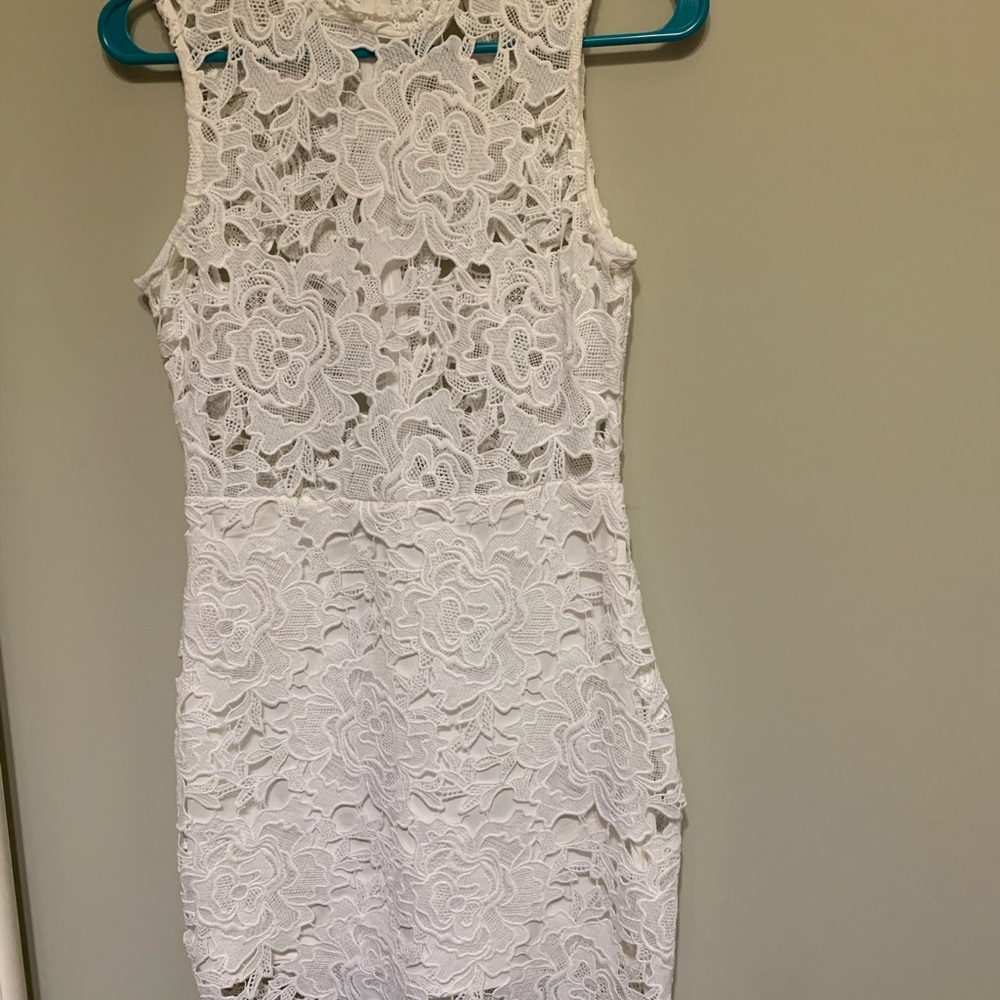 Beautiful white lace dress by Tobi! Perfect fir summer occasions.